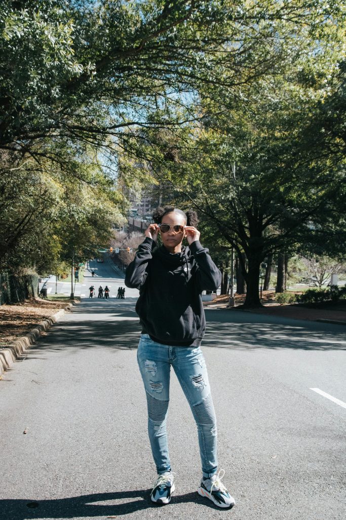 Solo traveler walking calmly on a Vietnam street during the day